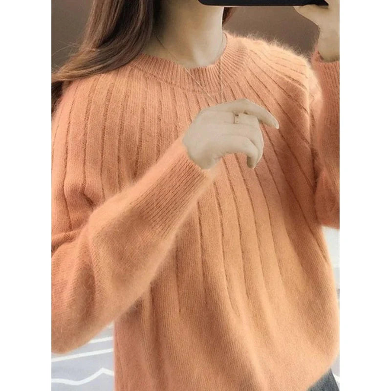 Pull tricoté femme rose mailles douces col rond